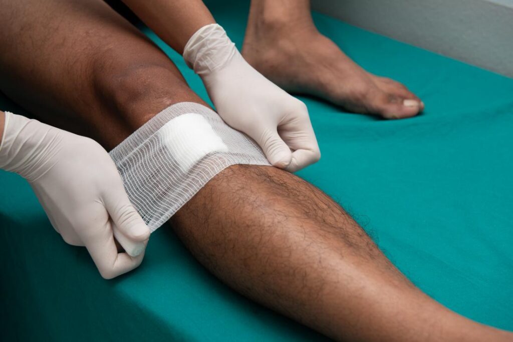first aid kit, dressing a wound, wound care, gauze pad, bandages, clean a cut, apply medical tape, stop bleeding, home wound treatment, basic first aid, antibiotic ointment, non-stick pad, urgent care tips, change bandages, signs of infection, wound hygiene, everyday injuries, scrapes and cuts, how to dress wounds, safe wound dressing thumbnail